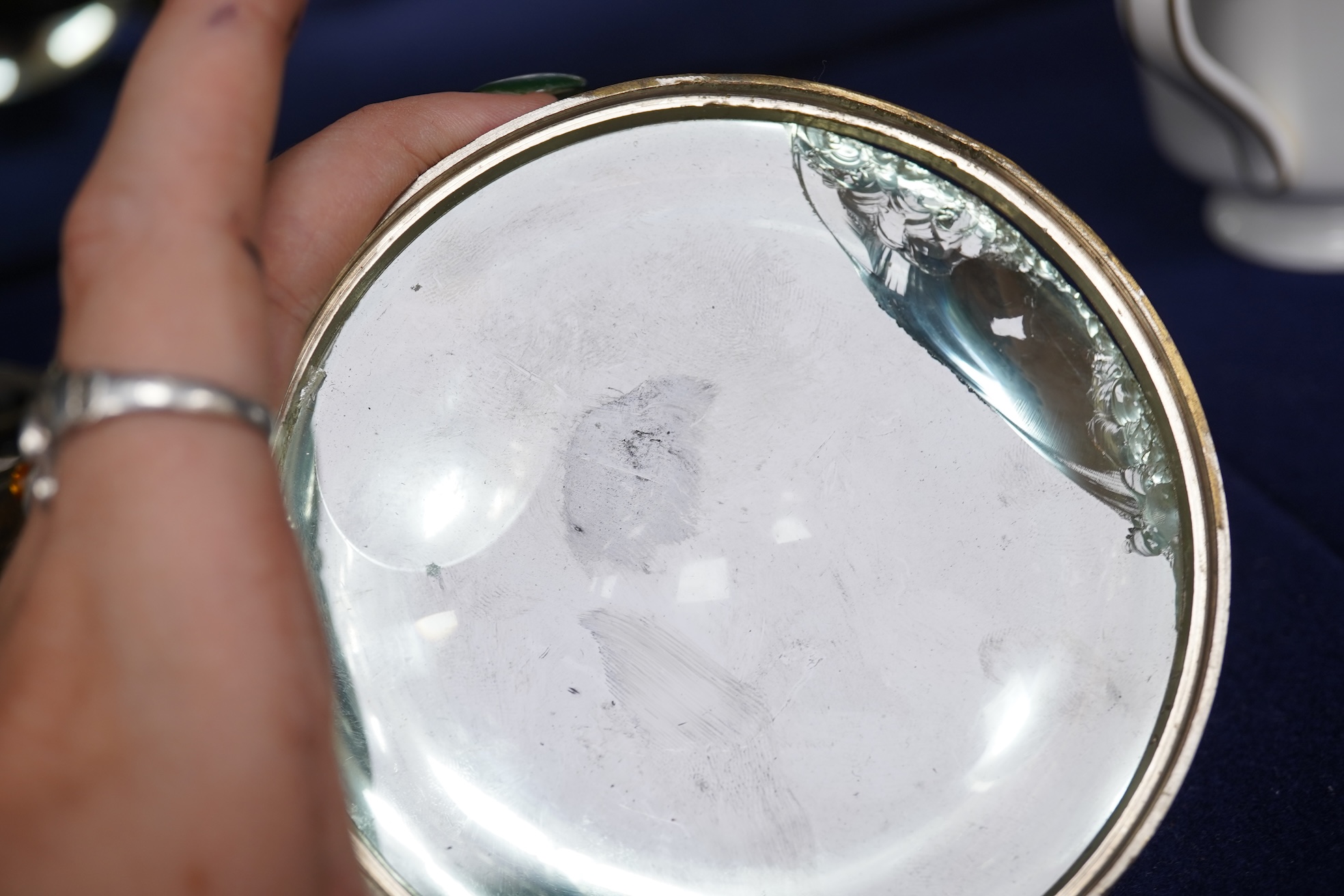 A large oversized spherical glass encased desk timepiece, with four subsidiary dials, 16cm